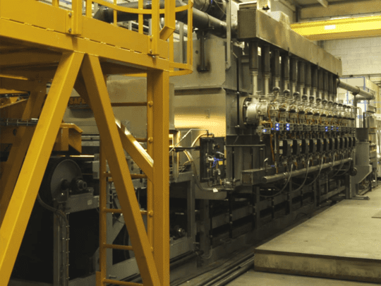 Four à bande à maillons métalliques